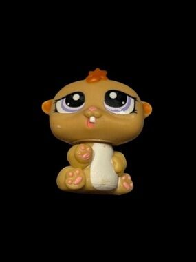 Hasbro Brown Hamster Figure with Purple Eyes and Pink Paws